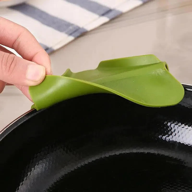 Anti-spill köksutrustings avböjare